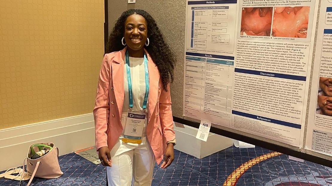 Seun Adebagbo presenting her poster presentation as a first author at an international symposium and annual meeting of the American Academy of Facial Plastic and Reconstructive Surgery. 