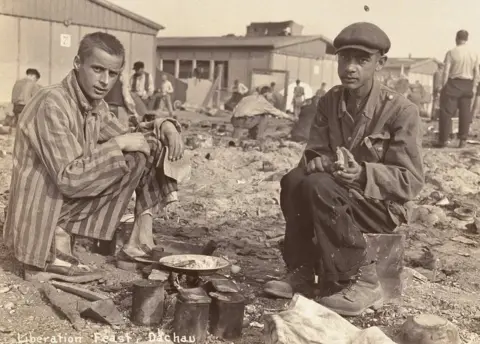 US Holocaust Memorial Museum The man on the right in this picture from the Dachau concentration camp is thought to be Jean Voste, born in Congo, who was the only black prisoner in the camp. Courtesy of Frank Manucci.