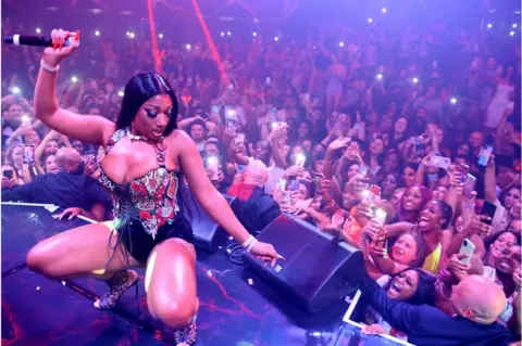 Getty Images Meghan thee Stallion performs in Las Vegas in July