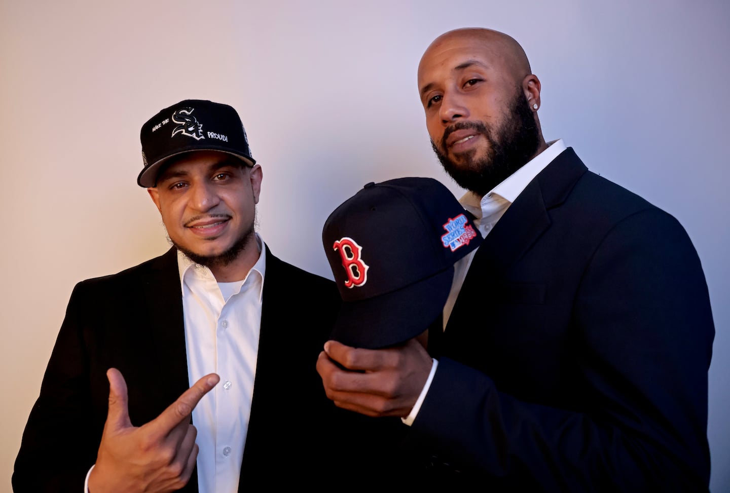 Al Objio (left) and Manny Gonzalez, the founders of Crown Legends, a hat boutique in the South End that sells exclusive, limited-edition baseball caps.
